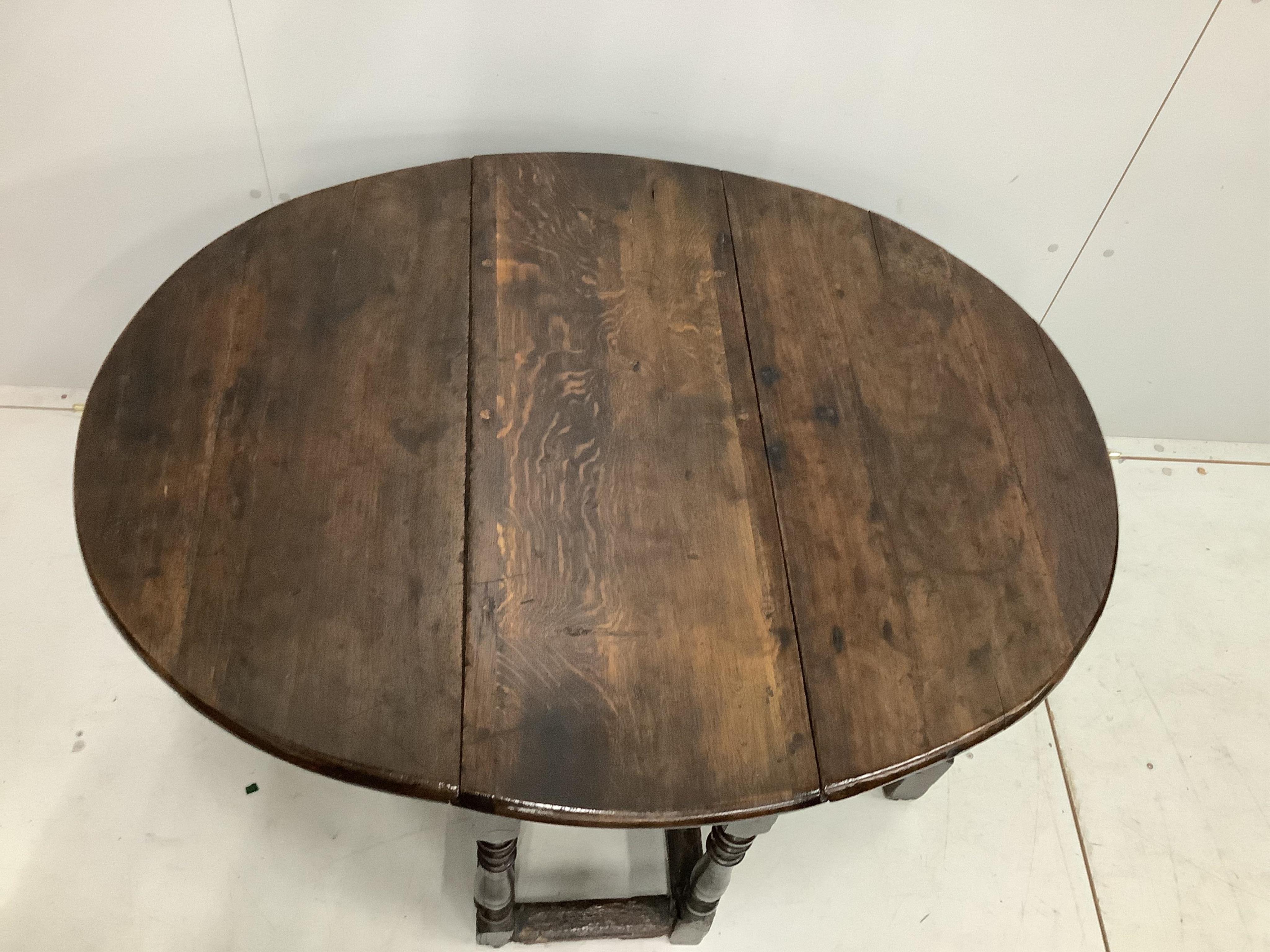 A small 17th century and later oak gateleg table, width 86cm, depth 31cm, height 68cm. Condition - fair